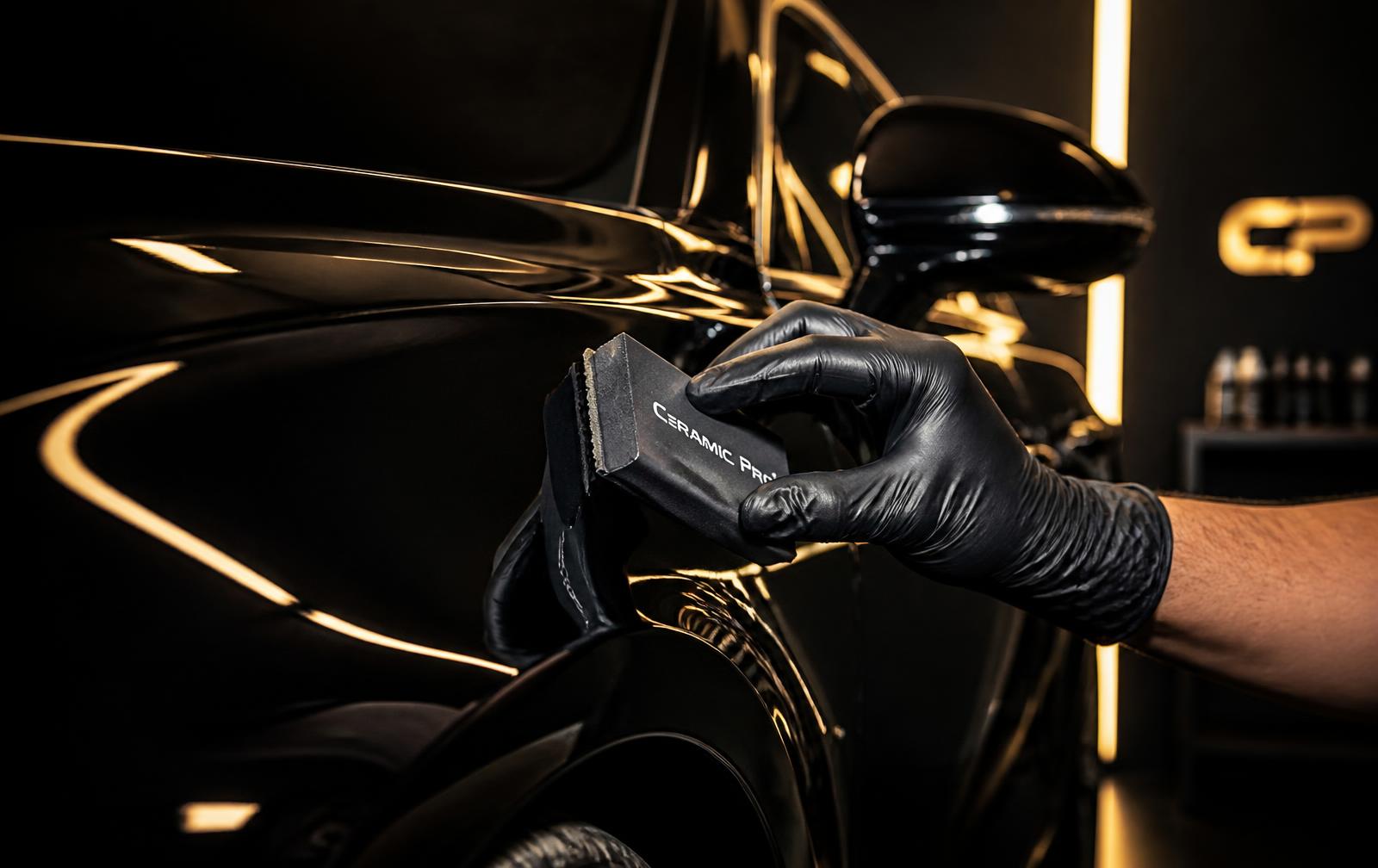 Ceramic coating application on a dark car panel